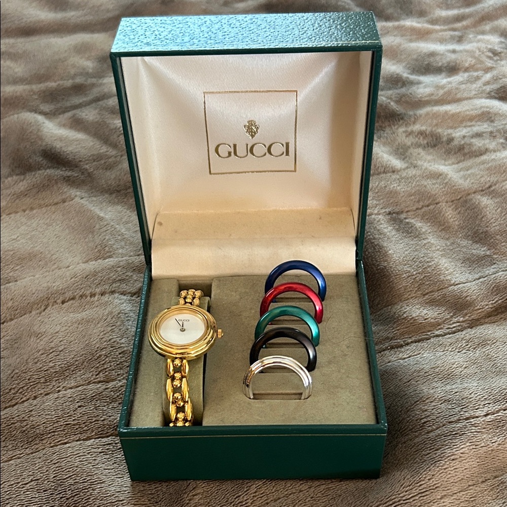 Gucci Gold Women's Bracelet Watch with Interchangeable Color Bezels